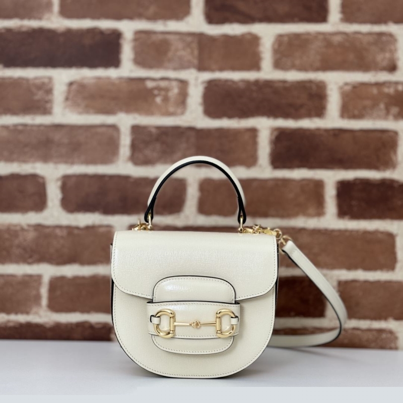 G*u*i top handle bags